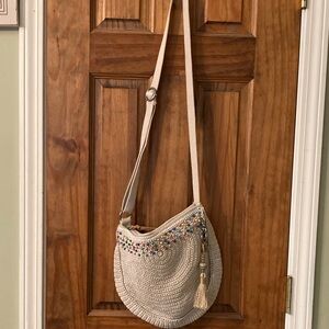 Beige Crochet Crossbody Bag with Multicolor Accents. THE SAK